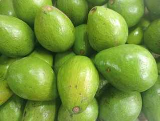 Piles of avocados for sale in supermarkets