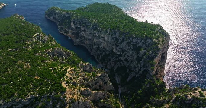 Aerial View of Calanque dEn-Vau near cassis town provence France. Breathtaking view of bay, a beautiful blue lagoon with a white sand beach, surrounded by cliffs, pines, near Marseille in France