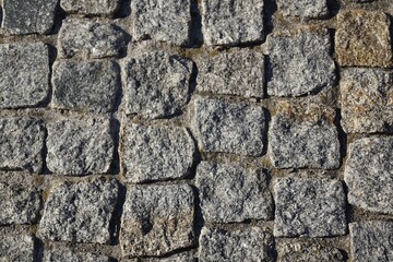 Cobblestones (paving stones) in bright sunlight - 2