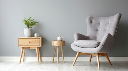 Modern living room with elegant armchair and wooden side table, embodying minimalist comfort and timeless design.
