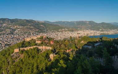 Obraz premium Panoramic view of the city at sunset from Alanya Castle. Antalya city, Turkey country
