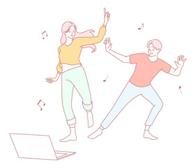 Two young friends are joyfully dancing together in their cozy home, happily enjoying lively music from a laptop