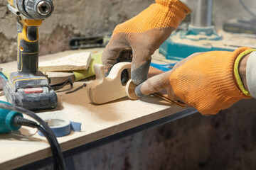 Caucasian craftsman working in a workshop.
