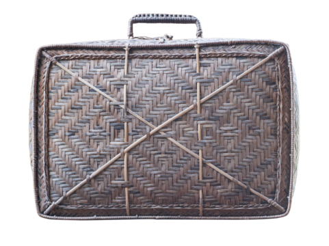 Old brown suitcase with a woven handle sits on transparent background.