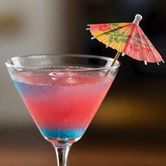 red cocktail with lime