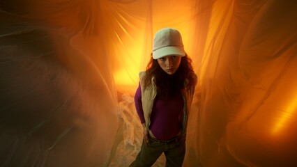 An Ethereal Lighting Fashion Portrait Featuring a Young Woman Wearing a Stylish Hat