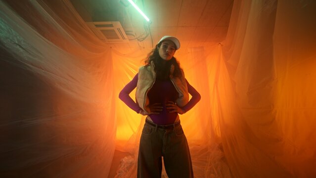 Fototapeta A Mystical Fashion Portrait Captured in Ambient Lighting with Draped Fabrics All Around