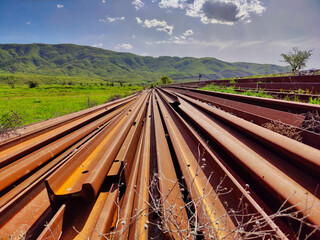 old disused train tracks in green valley
