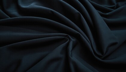 Obraz premium Elegant Fabric Texture: A close-up shot of a luxurious, draped fabric, showcasing its soft texture and subtle folds. The rich, dark tones add a touch of sophistication.
