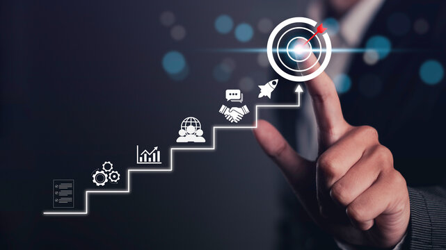 Business Growth Strategy overcoming Challenges to Achieve Market Success and hand touch Target Goals planning, increased performance, and strategic achievement for long-term success.