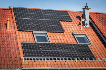Photovoltaic panels on the roof of family house, solar panels.