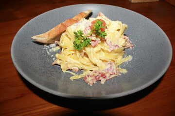 high angle view pasta on a blue plate