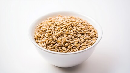 Fototapeta premium Bowl of raw barley grains on white background