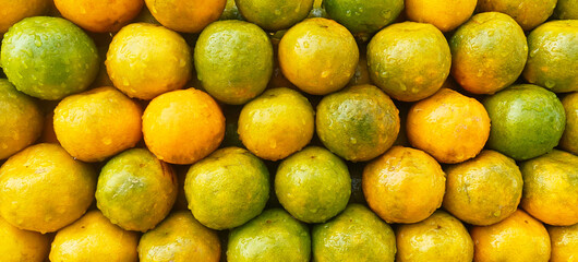 A pile of fresh oranges open sell in Indian market.
