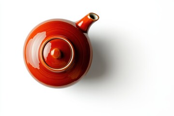 Elegant red ceramic teapot perfect for tea ceremonies isolated on white background Simple clean