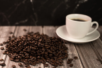 Arabica coffee beans, a cup of espresso coffee.