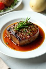 White plate with roast beef and rosemary garnish, beef roast, herb, cooking method