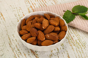 Tasty ripe almond nuts heap
