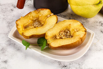 Baked quince with honey and cedar