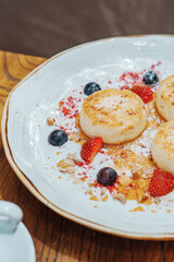 A fresh and delicious breakfast of cheesecakes and porridge