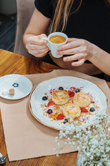 A fresh and delicious breakfast of cheesecakes and porridge