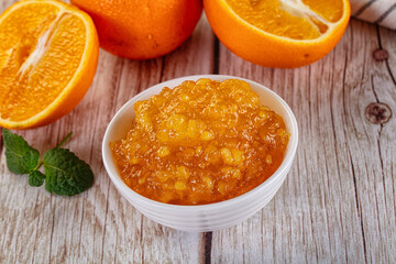 Sweet orange jam in the bowl
