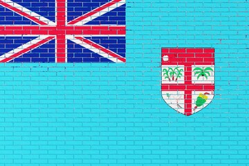 Flag of Fiji depicted on a brick wall. Flat view