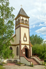 Belfry tower of St. Paul's Anglican church built during Gold Rush in Dawson city, Yukon territory, Canada