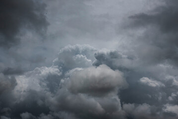 Dramatic dark storm thundercloud rain clouds on black sky background. Dark thunderstorm clouds...