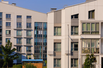 Cityscape on a summer day, modern buildings and houses 