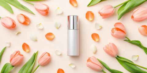 sleek, modern cylinder bottle stands elegantly amidst vibrant arrangement of pink tulips and delicate petals, creating fresh and inviting atmosphere