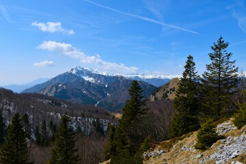 Valley and snow covered mountain peaks in Julian alps, Gorenjska, Slovenia