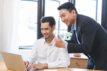 Congratulating, confidence two colleague asian businessman, male encourage staff for done excellent...