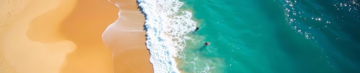 Fototapeta premium Aerial view of deep blue ocean waves crashing against sandy beach, water, sand, nature