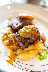 Iberian secret meat with candied apricots and vegetables, l'Escrivania Espai Gastronòmic ,...