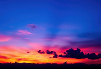 Fototapeta premium Silhouette of clouds against vibrant sunset, blue and purple hues, gradation, daybreak