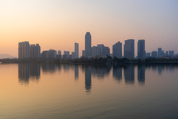 Obraz premium China Huizhou Jiangbei CBD city skyline sunset scenery