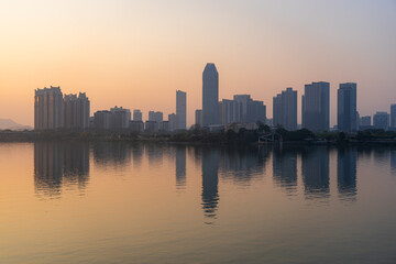 Obraz premium China Huizhou Jiangbei CBD city skyline sunset scenery