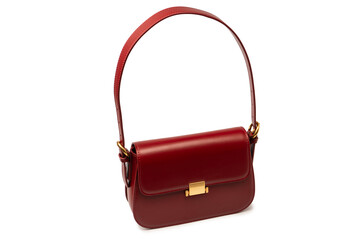 Burgundy shoulder leather bag isolated on white background.