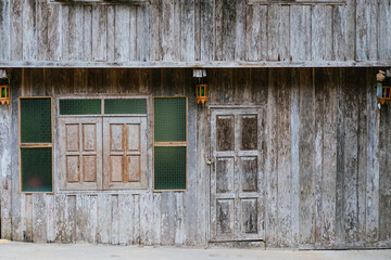Charming rustic wooden house exterior countryside architecture photography natural setting close-up vintage appeal
