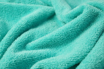 green towel fabric texture background close up