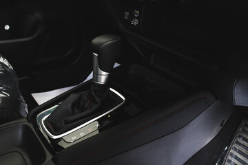 Automatic gear stick inside modern sport car. Driving car concept. Safe driving concept.