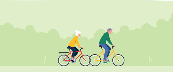 active senior couple enjoying a leisurely bike ride in a park