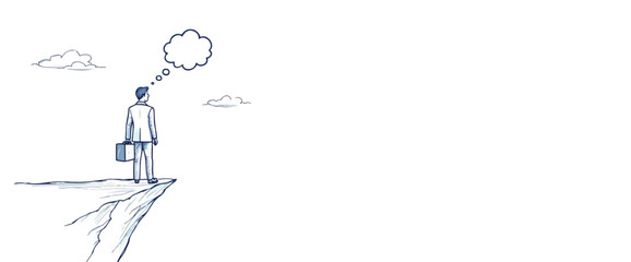 pensive businessman standing on a cliff contemplating his future