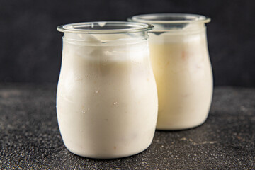 Skyr white yogurt appetizer dish fresh delicious gourmet food background on table rustic food top view copy space keto and paleo diet vegetarian food
