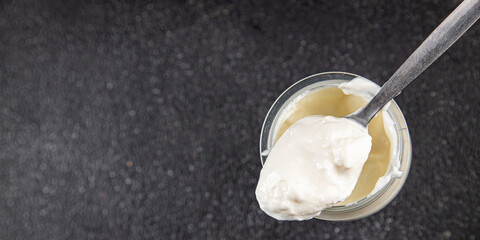 Skyr white yogurt appetizer dish fresh delicious gourmet food background on table rustic food top view copy space keto and paleo diet vegetarian food