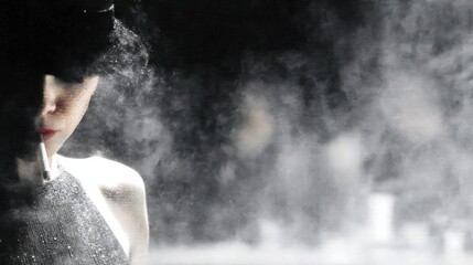 Obraz premium Mysterious figure in soft, hazy background light.