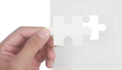 Puzzle piece insertion home office visual content indoor close-up problem solving concept