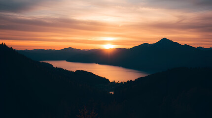 Obraz premium A peaceful sunrise over a tranquil lake with mountains in the background, soft pastel colors in the sky