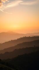 Obraz premium Ultra HD vertical landscape of misty layered hills bathed in golden sunrise light. Soft beams pierce dramatic sky gradients. Peaceful, cinematic, and photo-realistic natural beauty.
